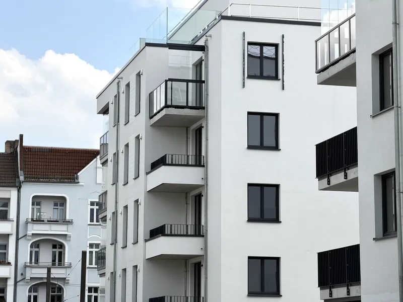 WBS 160/180/220 - Moderne Familienwohnung mit 4-Zimmern und Balkon — photo 1